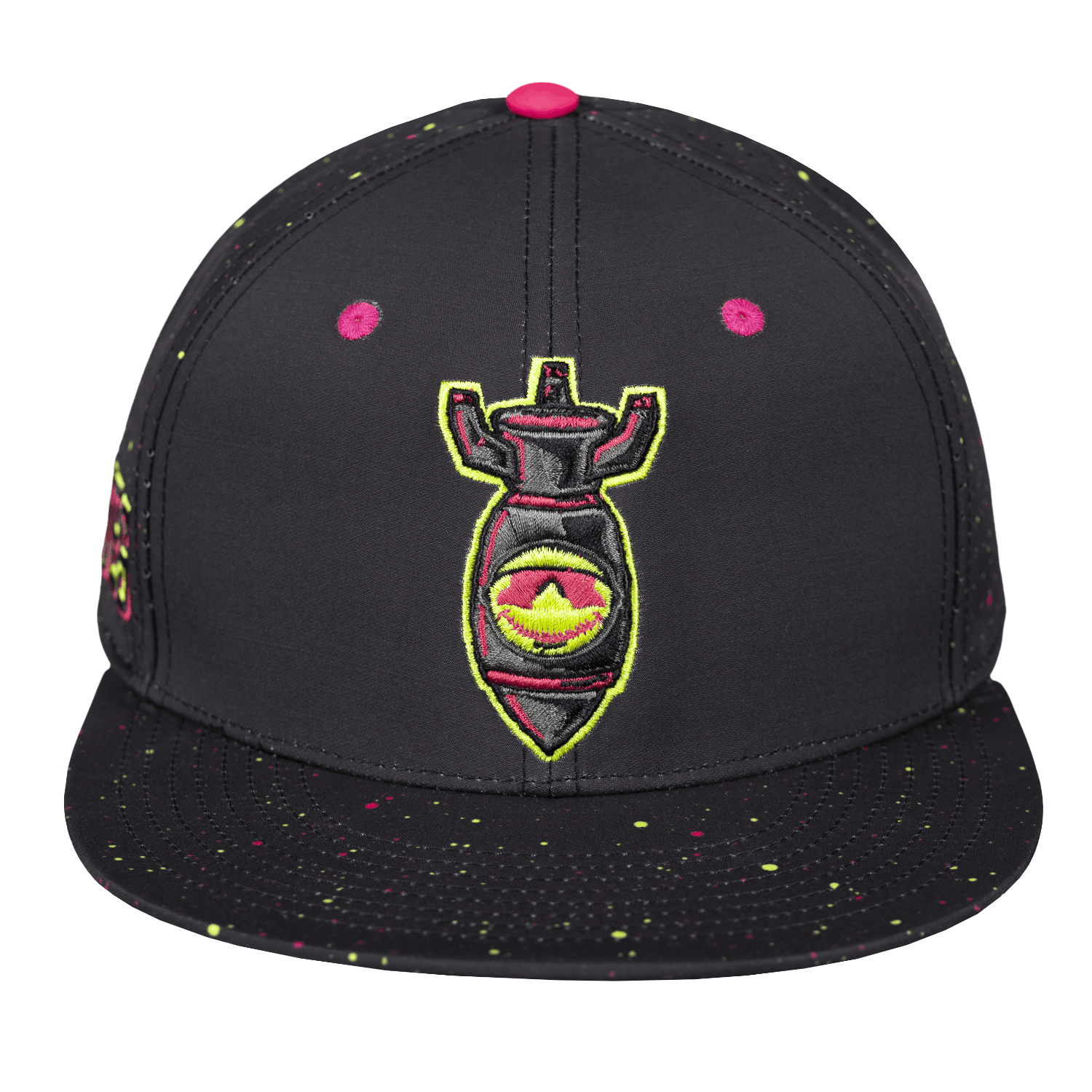 A black snapback baseball lifestyle cap with a flat brim, featuring a central embroidered graphic of a Nukes bomb with pink, yellow, and green details. The cap has pink snapback buttons and multicolor paint splatter details on the front panels and brim.