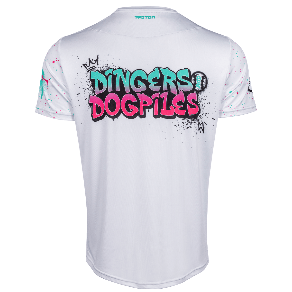 White short-sleeve athletic t-shirt with a colorful graphic on the back reading 'DINGERS DOGPILES' in teal and pink graffiti-style lettering, with small paint splatter details on the sleeves and back.